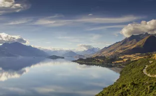 A large lake with a smooth surface